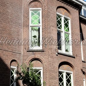 Backsteinfassade mit Fenstern - ImageShop